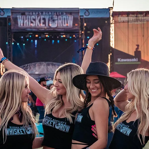 Guests enjoying an outdoor Whiskey Row concert