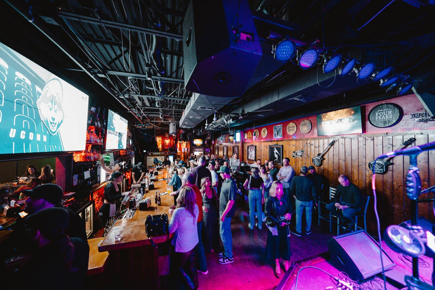 The stage and crowd inside Rockbar Inc.